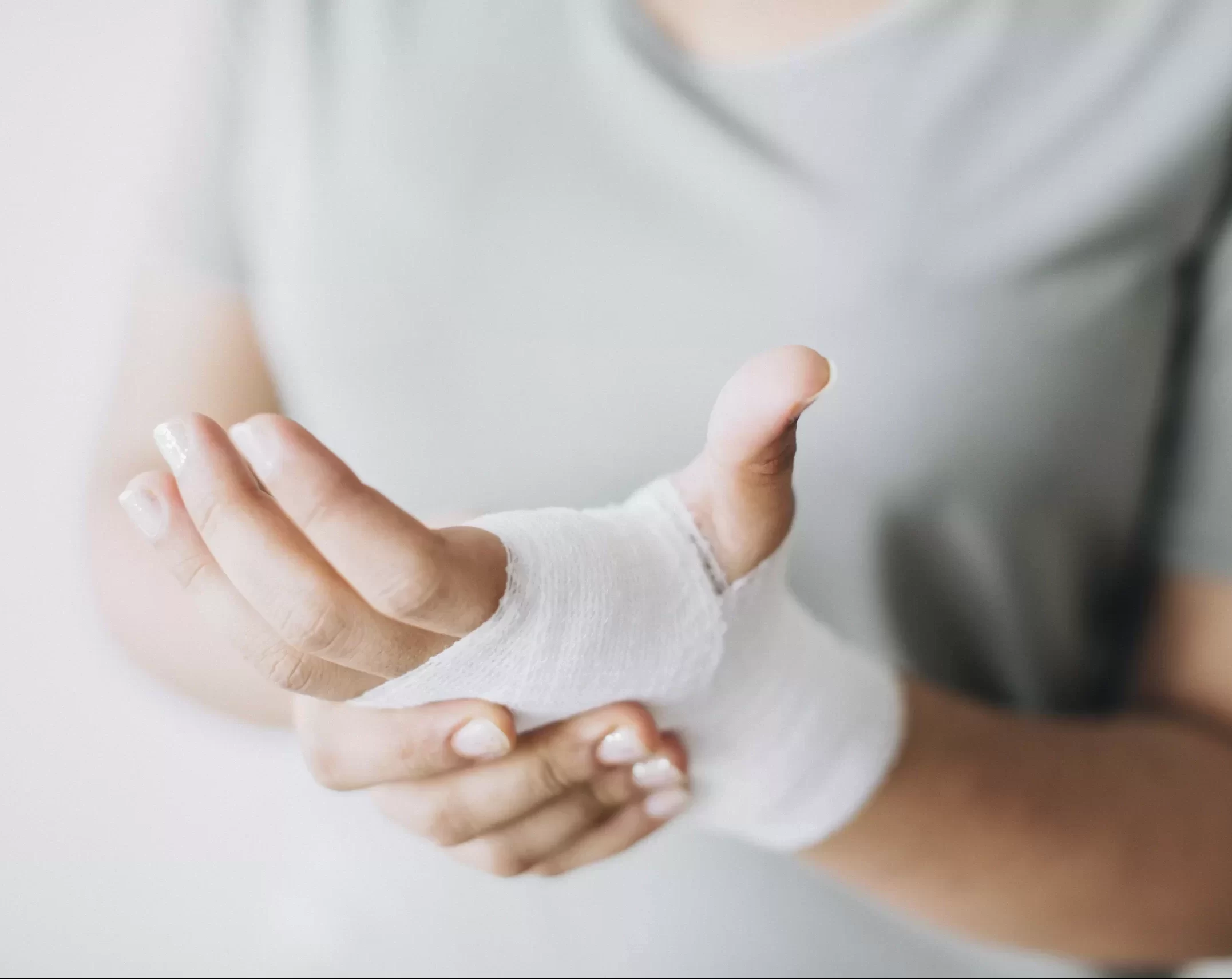 AnyConv.com__woman-with-gauze-bandage-wrapped-around-her-hand